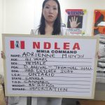 Adrienne Munju [suspect]